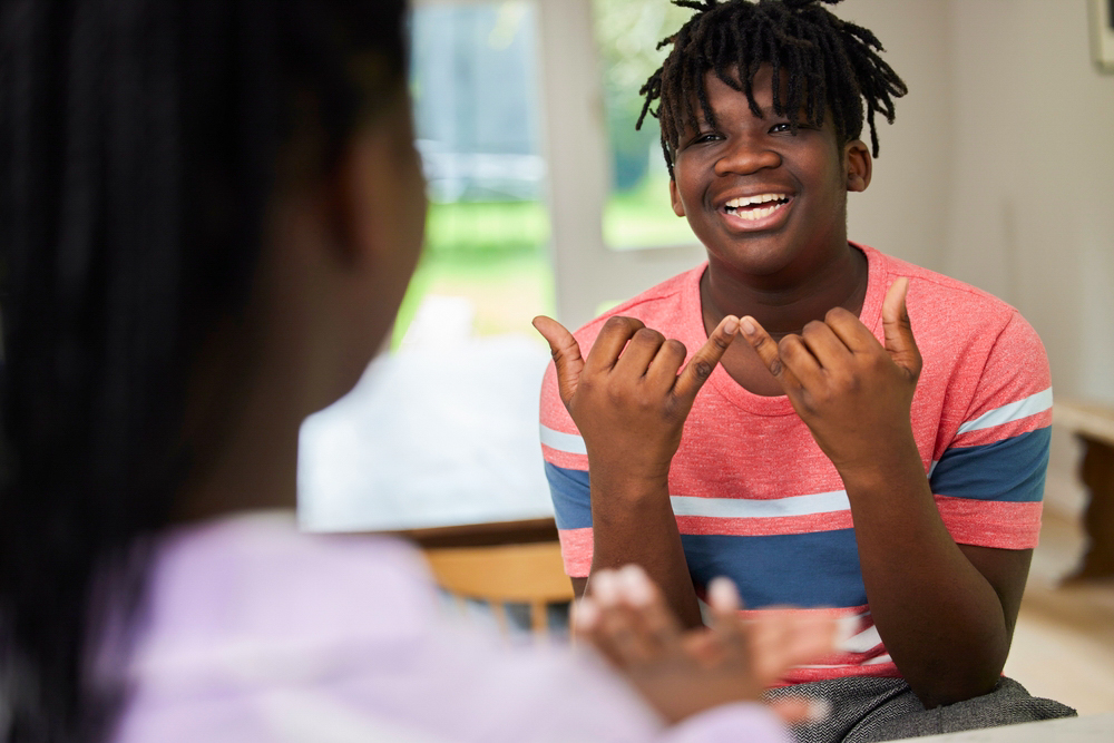 Young man using BSL