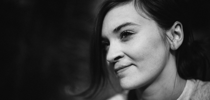 Black and white photo of a teen girl with a cleft lip.