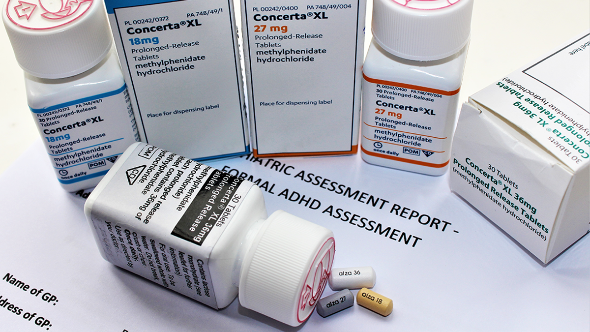 ADHD medication (Concerta) boxes and pill containers.