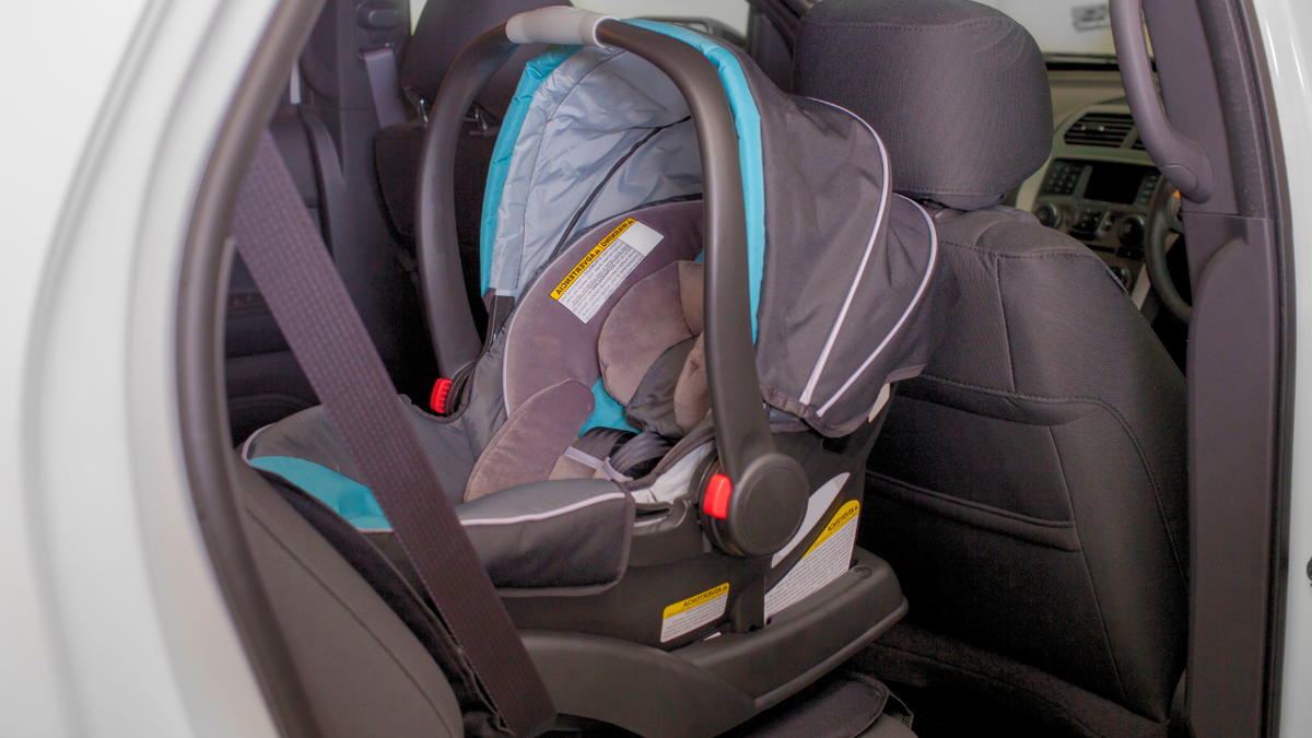 Empty rear facing car seat in car