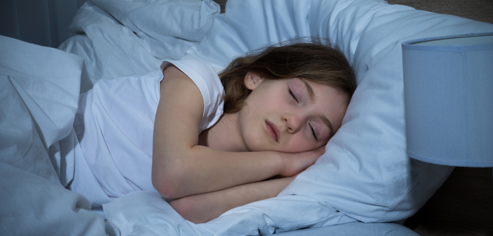 girl sleeping in bed