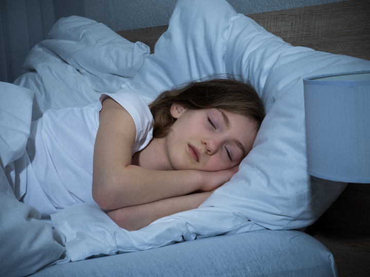 girl sleeping in bed